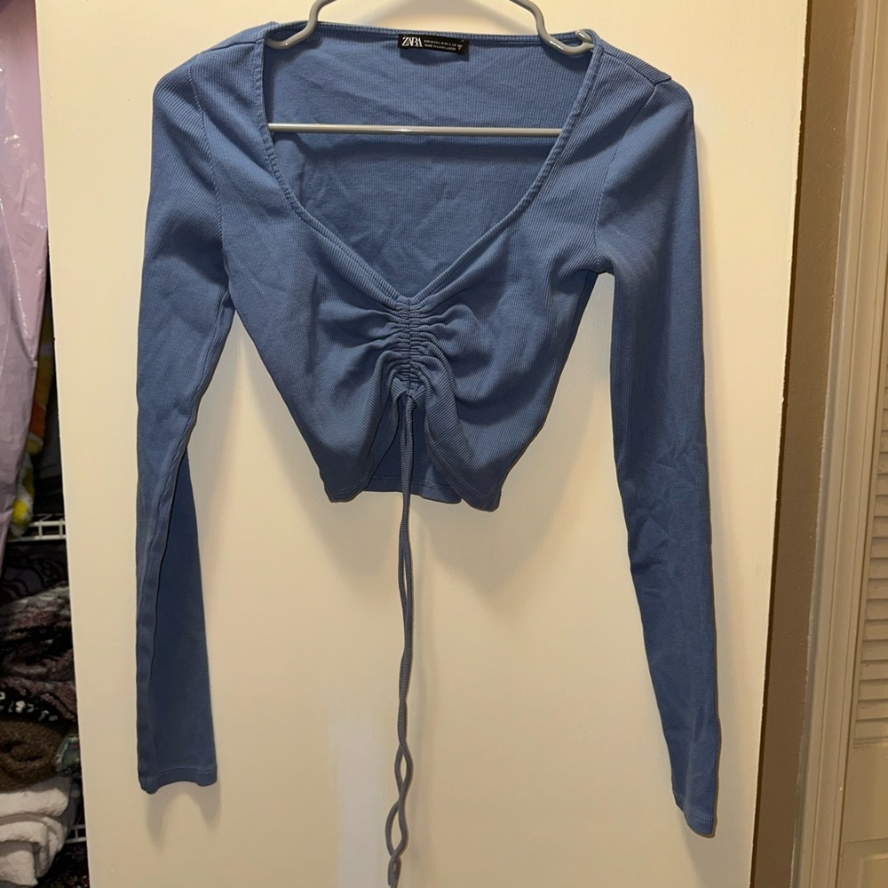 Blue long sleeve cinched crop top